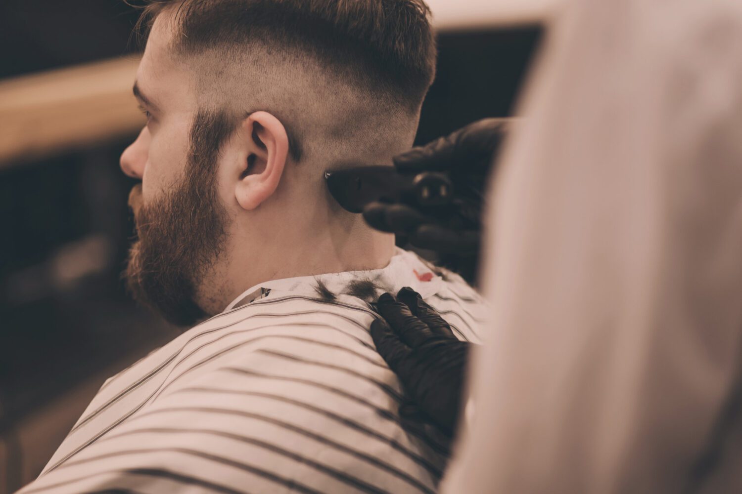 man visiting barbershop
