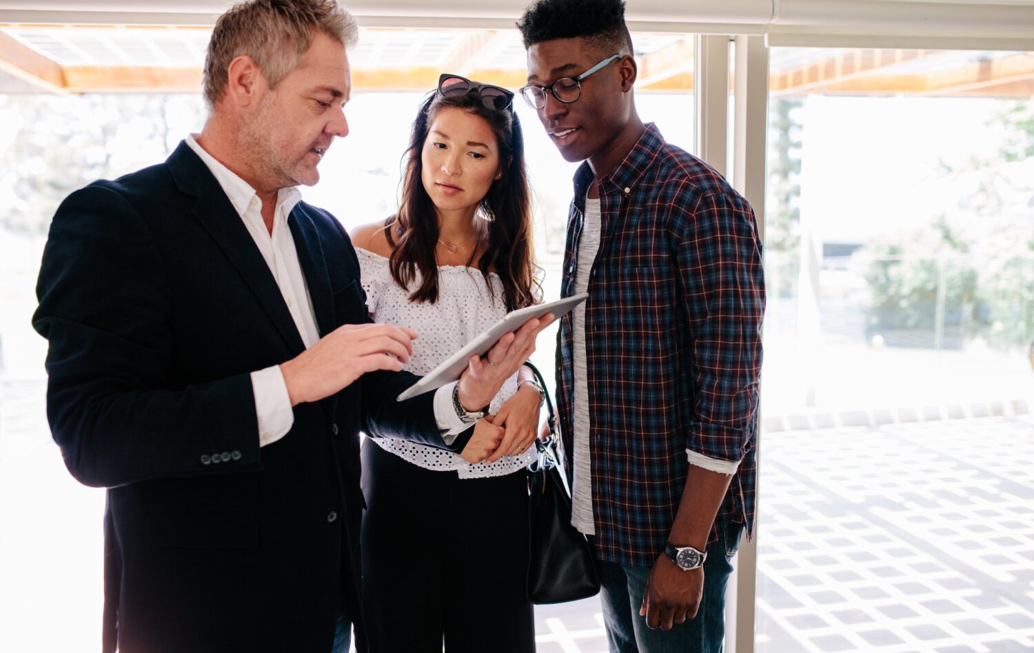 Realtor sharing property details with clients